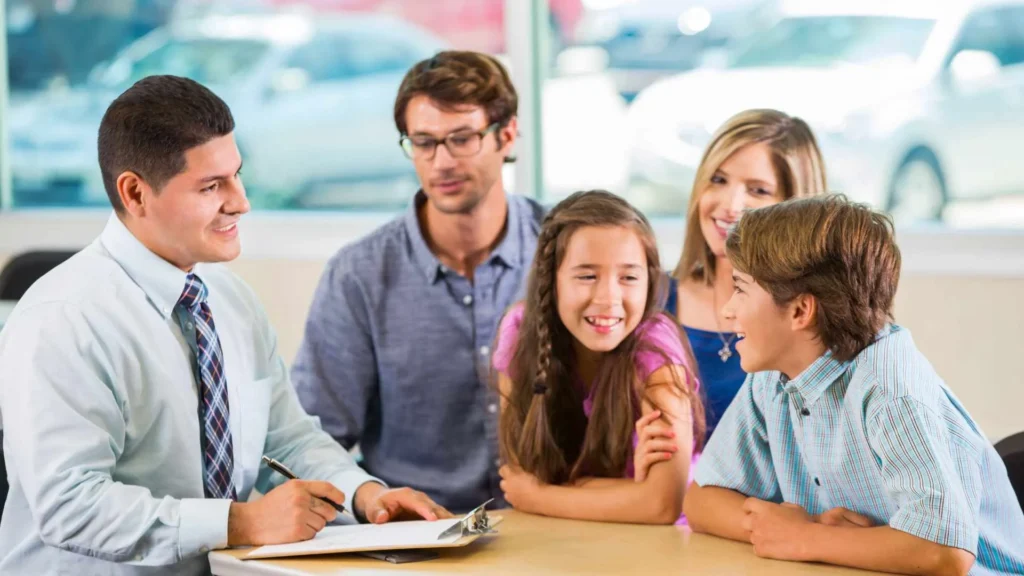 Teacher–parent meeting with the child.