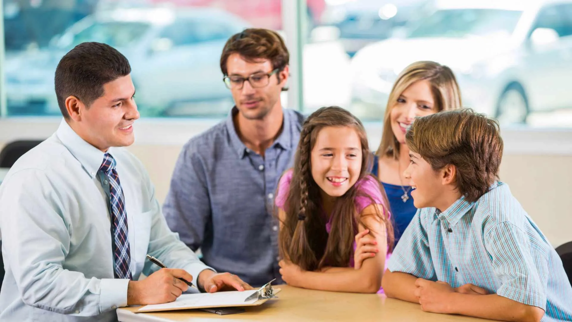 Teacher–parent meeting with the child.